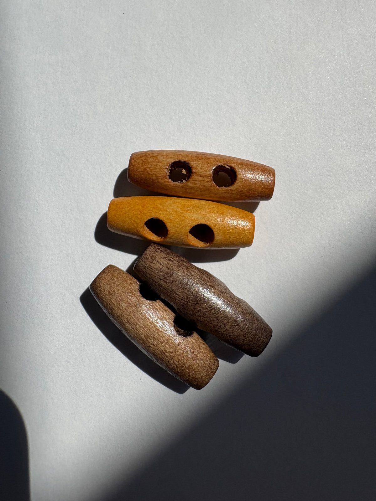 Boutons ovales en bois d’olivier 30 mm/8 couleurs